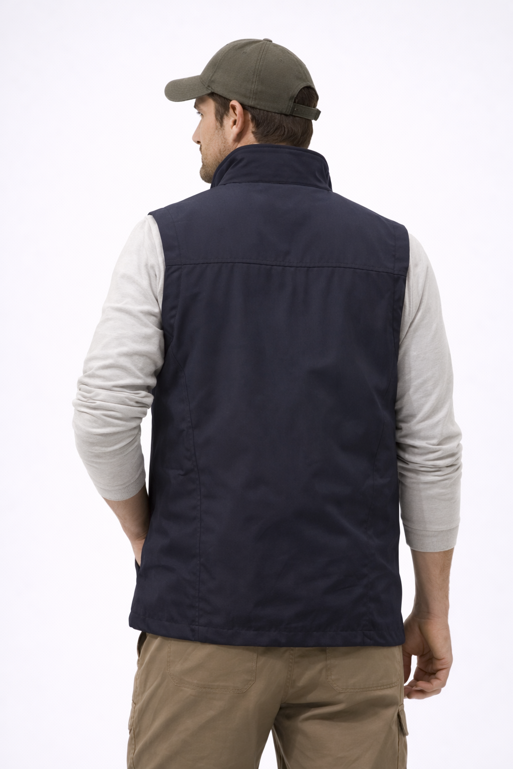 https://cdn.shopify.com/s/files/1/0821/1087/3856/files/Man_wearing_a_navy_blue_vest_with_a_white_background..png?v=1773870775