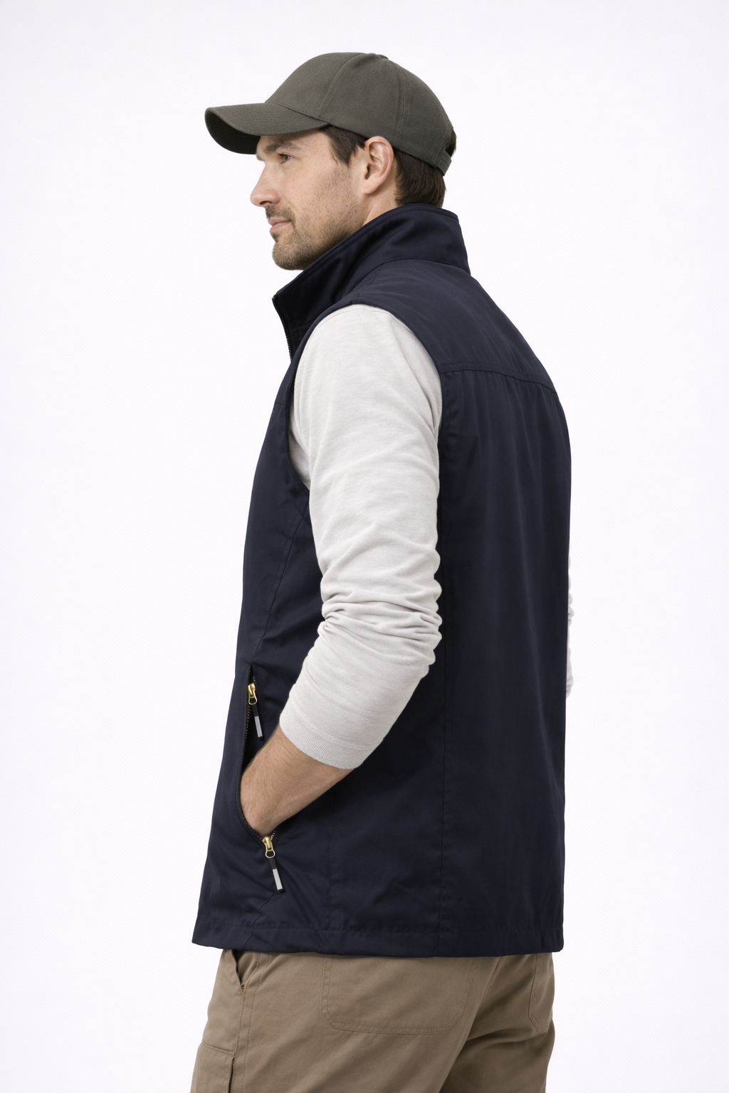 https://cdn.shopify.com/s/files/1/0821/1087/3856/files/Man_wearing_a_navy_vest_white_shirt_and_brown_cap_on_a_white_background.png?v=1773870805