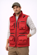 https://cdn.shopify.com/s/files/1/0821/1087/3856/files/Man_wearing_a_red_vest_with_multiple_pockets_on_a_white_background.png?v=1773869960